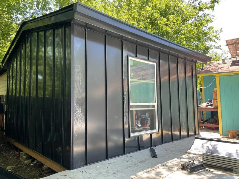 Black standing seam metal wall panels for Metal Roof Installation in Orange